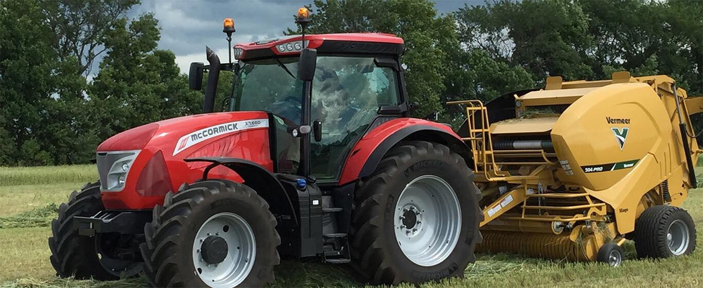 McCormick Tractor with Vermeer Round Baler